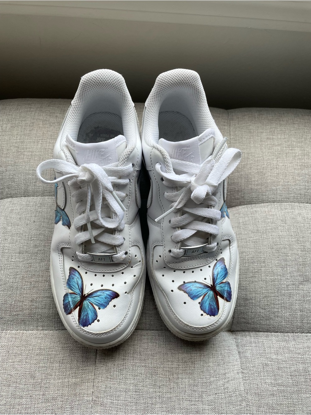 Nike White Sneakers with Blue Butterfly Artwork